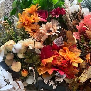 Autumn Floral Arrangement with Orange and Red Accents